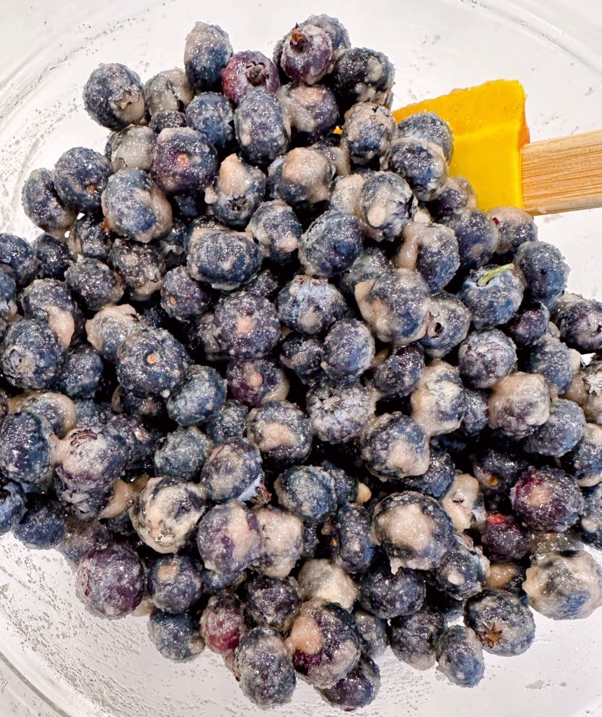 The blueberry filling mixture in a medium bowl.