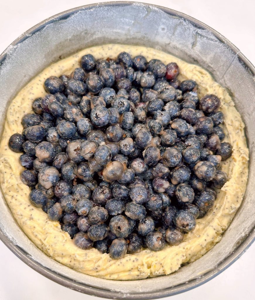 Blueberry filling in the center of the cake.