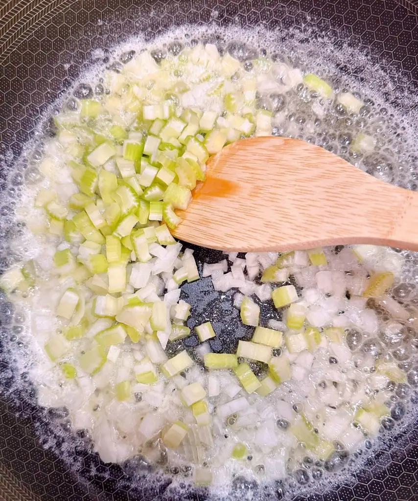 Saute celery and onions in butter.